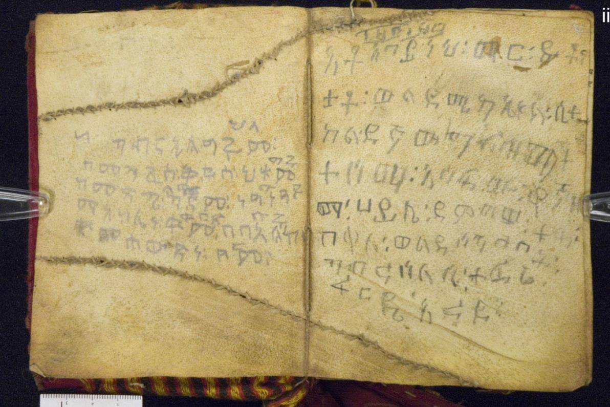 Ethiopic manuscript, two long tears due to skin blemishes, repaired with 'baseball stitches'. The St John's university and the college of St Benedict, USA, Alwan Codex 18.